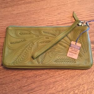 Hand tooled boutique leather clutch